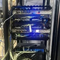 A tidy network rack with routers, switches and patch cabling